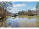 Idyllic lake view with private docks and serene surroundings, perfect for nature lovers at 3510 Riviera Dr, Cumming, GA 30041