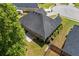 Aerial view of the home showing the roof, landscaping, and fenced backyard at 4368 Magnolia Bay Ln, Snellville, GA 30039