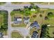 Aerial view of the lot at 4368 Magnolia Bay Ln with the house and a small shed labeled at 4368 Magnolia Bay Ln, Snellville, GA 30039