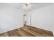 Neutral bedroom features wood-look floors, white trim, ceiling fan, and is ready for personalization at 4368 Magnolia Bay Ln, Snellville, GA 30039