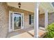 The entrance features decorative door with sidelights and columns, creating an inviting entrance at 4368 Magnolia Bay Ln, Snellville, GA 30039