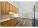 Kitchen featuring wood cabinets, stainless steel appliances, and lots of natural light at 4368 Magnolia Bay Ln, Snellville, GA 30039