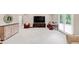 Finished basement features a seating area, console, and walk-out to the outdoors at 5075 Briarstone Ridge Way, Alpharetta, GA 30022