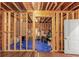 Unfinished basement area framed with wooden studs and ready for customization at 5075 Briarstone Ridge Way, Alpharetta, GA 30022