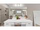 Bathroom vanity area with a large mirror and a glass shower at 5075 Briarstone Ridge Way, Alpharetta, GA 30022
