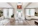 The foyer features an entry door, soaring ceilings, and wood-look floors at 5075 Briarstone Ridge Way, Alpharetta, GA 30022
