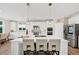 Modern kitchen features a large island, stainless steel appliances, and pendant lights at 5075 Briarstone Ridge Way, Alpharetta, GA 30022