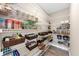 Walk-in pantry with wire shelving and storage containers, maximizing kitchen space at 5075 Briarstone Ridge Way, Alpharetta, GA 30022
