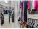 Well-organized walk-in closet with custom shelving and ample storage space at 2109 Rugby Ave, Atlanta, GA 30337
