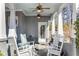 Inviting front porch with classic white rocking chairs, offering a relaxing outdoor space at 2109 Rugby Ave, Atlanta, GA 30337