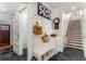 Inviting mudroom with built-in bench, storage, hooks, and stylish tile flooring at 2109 Rugby Ave, Atlanta, GA 30337