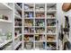 Walk-in pantry with custom shelving providing ample storage space for food and kitchen supplies at 2109 Rugby Ave, Atlanta, GA 30337