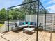 Outdoor entertaining space includes deck with lights and outdoor seating at 2413 Hunting Valley Dr, Decatur, GA 30033