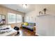 Inviting bedroom featuring natural light, wood paneling, and a cozy futon at 2413 Hunting Valley Dr, Decatur, GA 30033