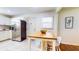 Bright kitchen with stainless steel appliances, a butcher block island, and tile flooring at 2413 Hunting Valley Dr, Decatur, GA 30033