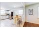Bright kitchen features stainless steel appliances, white cabinets, and an eat-in island at 2413 Hunting Valley Dr, Decatur, GA 30033