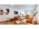 Open-concept living room with hardwood floors, stylish decor, and ample natural light at 2413 Hunting Valley Dr, Decatur, GA 30033