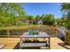 Lakeside deck perfect for outdoor relaxation with scenic views of the water at 6185 Deerwoods Trl, Alpharetta, GA 30005