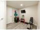 Home gym with weights and equipment for a complete workout at 6185 Deerwoods Trl, Alpharetta, GA 30005