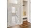 Charming mudroom with a decorative floor, and built-in bench seating and storage at 6185 Deerwoods Trl, Alpharetta, GA 30005
