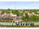 Community aerial view featuring brick buildings, lush greenery, and a welcoming entrance at 791 Wylie Se St # 709, Atlanta, GA 30316