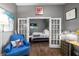 Hallway showing bedroom with natural light and stylish decor at 791 Wylie Se St # 709, Atlanta, GA 30316