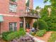 Charming brick building with a lovely balcony and beautiful landscaping at 791 Wylie Se St # 709, Atlanta, GA 30316