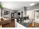 Open concept living and kitchen area with granite counters and stainless sink at 791 Wylie Se St # 709, Atlanta, GA 30316
