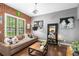 Cozy living room with modern decor, brick wall, and stylish seating at 791 Wylie Se St # 709, Atlanta, GA 30316