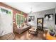Open living room with exposed brick wall, hardwood floors, and stylish furniture at 791 Wylie Se St # 709, Atlanta, GA 30316
