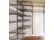 Organized closet with multiple adjustable metal shelves and rods at 1661 La France Ne St # 221, Atlanta, GA 30307