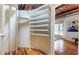 Unique closet design features rounded shelves and exposed ductwork above at 1661 La France Ne St # 221, Atlanta, GA 30307