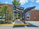 Exterior building view showcasing the modern architecture and attractive covered walkway, enhancing curb appeal at 1661 La France Ne St # 221, Atlanta, GA 30307