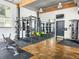 Spacious fitness center featuring modern equipment, weights, mirrors, and ample workout space at 1661 La France Ne St # 221, Atlanta, GA 30307