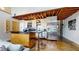 Modern kitchen with stainless steel appliances, island with seating, and open shelving at 1661 La France Ne St # 221, Atlanta, GA 30307