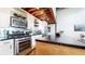 Contemporary kitchen with stainless steel appliances and a center island at 1661 La France Ne St # 221, Atlanta, GA 30307