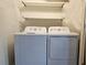Laundry room features a side-by-side washer and dryer at 1661 La France Ne St # 221, Atlanta, GA 30307