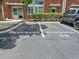 Reserved parking spots in front of a brick building; easy access to the building at 1661 La France Ne St # 221, Atlanta, GA 30307