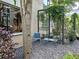 Beautiful patio features black stone landscaping and decorative flora at 1661 La France Ne St # 221, Atlanta, GA 30307