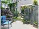Relaxing patio features stylish furniture and verdant foliage at 1661 La France Ne St # 221, Atlanta, GA 30307