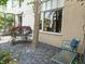 Private patio area with modern chair and table perfect for relaxation and enjoying the outdoor space at 1661 La France Ne St # 221, Atlanta, GA 30307