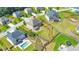 Aerial view of a home showcasing a large, well-manicured backyard and a private swimming pool at 197 Hickory Pointe Dr, Acworth, GA 30101