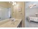 Bathroom with large mirror, granite countertop, and bedroom view at 197 Hickory Pointe Dr, Acworth, GA 30101