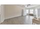 Bright bedroom with light gray wood flooring, ceiling fan and windows at 197 Hickory Pointe Dr, Acworth, GA 30101