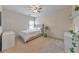 Cozy bedroom with natural light, neutral decor and plush carpet at 197 Hickory Pointe Dr, Acworth, GA 30101