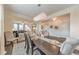 Dining area boasts an elegant chandelier and open views of the spacious living areas at 197 Hickory Pointe Dr, Acworth, GA 30101