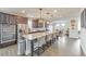 Spacious kitchen boasts a large center island with barstool seating and stainless steel appliances at 197 Hickory Pointe Dr, Acworth, GA 30101