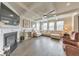 Inviting living room with coffered ceilings, fireplace, and large sectional sofa at 197 Hickory Pointe Dr, Acworth, GA 30101