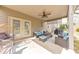 Covered patio featuring a seating area and ceiling fan at 197 Hickory Pointe Dr, Acworth, GA 30101
