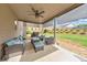 Covered patio featuring a seating area and ceiling fan at 197 Hickory Pointe Dr, Acworth, GA 30101
